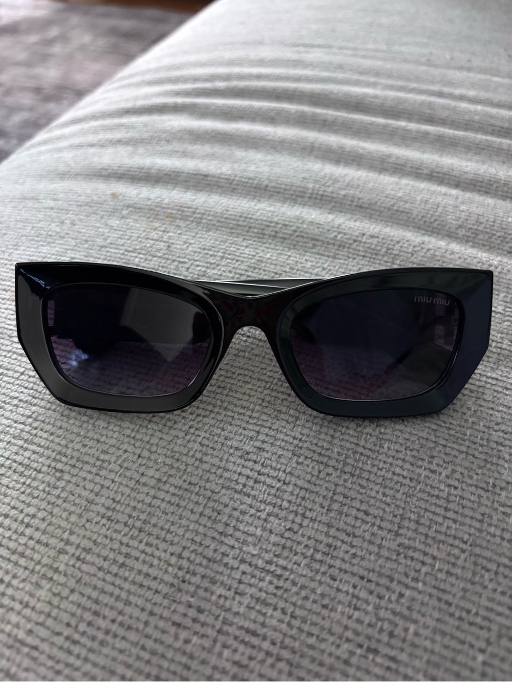 Miu Miu Black Cat-Eye Sunglasses with Dark Lenses